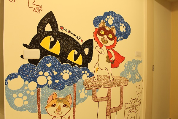 咖啡店內的插畫是由MOMOCAT的客人設計。　江幸芸/攝